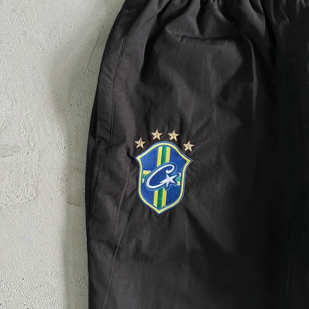 Calça Corteiz Olympic Shuku Brasil Black