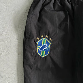 Calça Corteiz Olympic Shuku Brasil Black